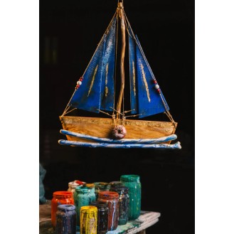 Olive wooden boat with 4 sails & greek flag blue colour. 